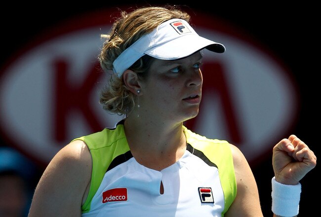 MELBOURNE, AUSTRALIA - JANUARY 18:  Kim Clijsters of Belgium celebrates in her second round match against Stephanie Foretz Gacon of France during day three of the 2012 Australian Open at Melbourne Park on January 18, 2012 in Melbourne, Australia.  (Photo by Clive Brunskill/Getty Images)