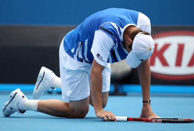 MELBOURNE, AUSTRALIA - JANUARY 18:  Mardy Fish of the United States reacts in his second round match against Alejandro Falla of Colombia during day three of the 2012 Australian Open at Melbourne Park on January 18, 2012 in Melbourne, Australia.  (Photo by Scott Barbour/Getty Images)
