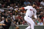 BOSTON, MA - SEPTEMBER 1: Carl Crawford #13 of the Boston Red Sox swings at a pitch in the eighth inning as catcher Russell Martin #55 of the New York Yankees looks on at Fenway Park on September 1, 2011 in Boston, Massachusetts. The Yankees won the game 4-2. (Photo by Darren McCollester/Getty Images)