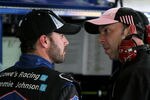 CHARLOTTE, NC - OCTOBER 13:  Jimmie Johnson (L), driver of the #48 Lowe's/Chevy 100th Anniversay Chevrolet, talks with his crew chief Chad Knaus during practice for the NASCAR Sprint Cup Series Bank of America 500 at Charlotte Motor Speedway on October 13, 2011 in Charlotte, North Carolina.  (Photo by Jerry Markland/Getty Images for NASCAR)