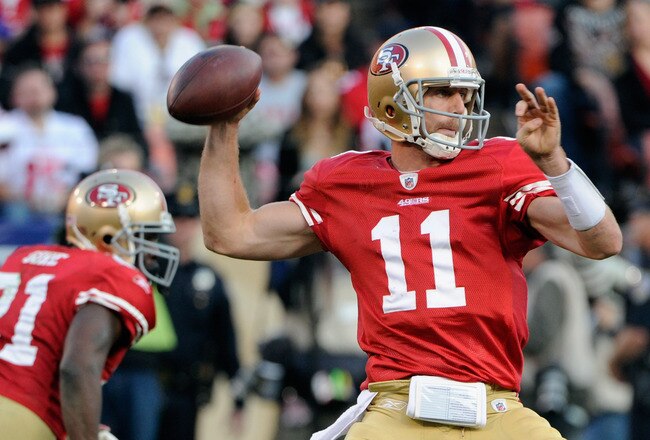 SAN FRANCISCO, CA - JANUARY 14:  Alex Smith #11 of the San Francisco 49ers looks to pass from the pocket during the NFC Divisional playoff game against the New Orleans Saints at Candlestick Park on January 14, 2012 in San Francisco, California.  (Photo by Thearon W. Henderson/Getty Images)