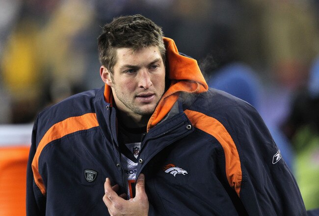 FOXBORO, MA - JANUARY 14:  Tim Tebow #15 of the Denver Broncos looks on against the New England Patriots during their AFC Divisional Playoff Game at Gillette Stadium on January 14, 2012 in Foxboro, Massachusetts.  (Photo by Jim Rogash/Getty Images)