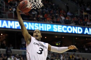 WASHINGTON - MARCH 17:  Dion Dixon #3 of the Cincinnati Bearcats puts up a shot against the Missouri Tigers during the second round of the 2011 NCAA men's basketball tournament at the Verizon Center on March 17, 2011 in Washington, DC.  (Photo by Nick Laham/Getty Images)