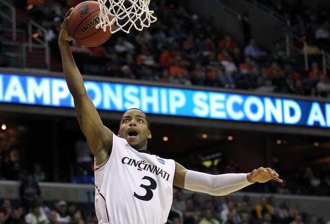 WASHINGTON - MARCH 17:  Dion Dixon #3 of the Cincinnati Bearcats puts up a shot against the Missouri Tigers during the second round of the 2011 NCAA men's basketball tournament at the Verizon Center on March 17, 2011 in Washington, DC.  (Photo by Nick Laham/Getty Images)