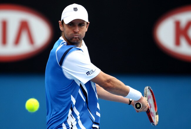 MELBOURNE, AUSTRALIA - JANUARY 18:  Mardy Fish of the USA plays a backhand in his second round match against Alejandro Falla of Columbia during day three of the 2012 Australian Open at Melbourne Park on January 18, 2012 in Melbourne, Australia.  (Photo by Scott Barbour/Getty Images)