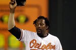 BALTIMORE, MD - SEPTEMBER 26: Vladimir Guerrero #27 of the Baltimore Orioles waves to the crowd after getting his 2,587th career hit to become the all-time leader in hits by a Dominican-born player during the sixth inning against the Boston Red Sox  at Oriole Park at Camden Yards on September 26, 2011 in Baltimore, Maryland.  (Photo by Rob Carr/Getty Images)