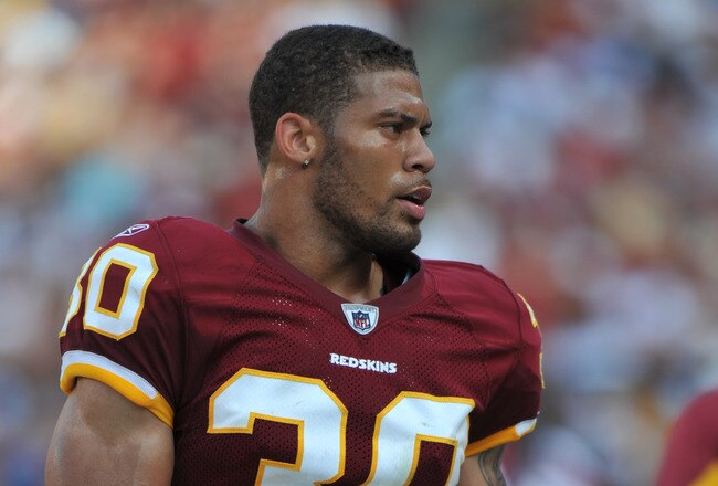 LANDOVER - SEPTEMBER 19:  LaRon Landry #30 of the Washington Redskins walks in the bench area during the game against the Houston Texans at FedExField on September 19, 2010 in Landover, Maryland. The Texans defeated the Redskins in overtime 30-27. (Photo by Larry French/Getty Images)