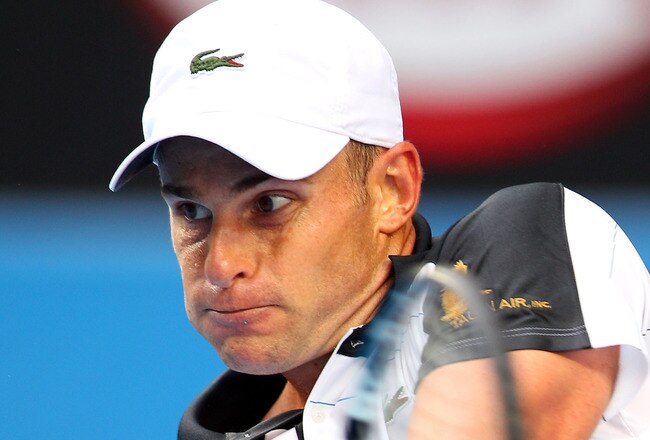 MELBOURNE, AUSTRALIA - JANUARY 17:  Andy Roddick of the United States of America plays a backhand in his first round match against Robin Haase of the Netherlands during day two of the 2012 Australian Open at Melbourne Park on January 17, 2012 in Melbourne, Australia.  (Photo by Mark Kolbe/Getty Images)