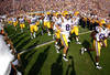 BATON ROUGE, LA - NOVEMBER 25:  Linebacker Lamin Barrow #57 and quarterback Zach Mettenberger #8 of the LSU Tigers and the rest of their teammates run out onto the field before taking on the Arkansas Razorbacks at Tiger Stadium on November 25, 2011 in Baton Rouge, Louisiana.  (Photo by Chris Graythen/Getty Images)