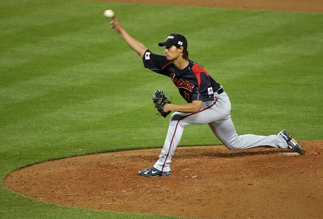 LOS ANGELES, CA - MARCH 23:   Relief pitcher Yu Darvish #11 of Japan throws a pitch against Korea during the finals of the 2009 World Baseball Classic on March 23, 2009 at Dodger Stadium in Los Angeles, California. (Photo by Stephen Dunn/Getty Images)