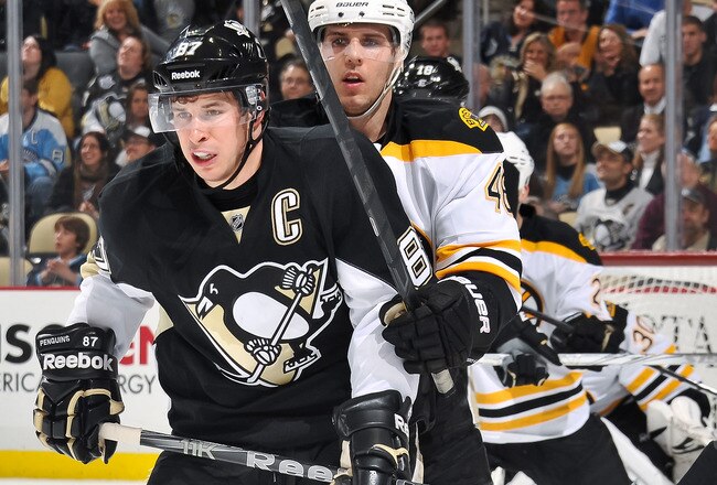 PITTSBURGH, PA - DECEMBER 5:  Sidney Crosby #87 of the Pittsburgh Penguins and David Krejci #46 of the Boston Bruins battle for position on December 5, 2011 at CONSOL Energy Center in Pittsburgh, Pennsylvania.  (Photo by Jamie Sabau/Getty Images)