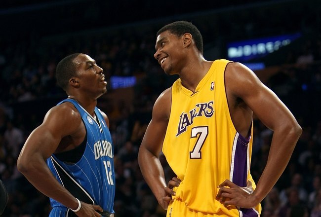 LOS ANGELES - JANUARY 16:  Andrew Bynum #17 of the Los Angeles Lakers and Dwight Howard #12 of the Orlando Magic look on during a break in their NBA game on January 16, 2009 at Staples Center in Los Angeles, California. The Magic won 109-103.   NOTE TO USER: User expressly acknowledges and agrees that, by downloading and/or using this Photograph, user is consenting to the terms and conditions of the Getty Images License Agreement. (Photo by Stephen Dunn/Getty Images)