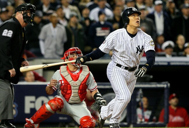NEW YORK - NOVEMBER 04:  Hideki Matsui #55 of the New York Yankees hits a 2-run home run in the bottom of the second inning against the Philadelphia Phillies in Game Six of the 2009 MLB World Series at Yankee Stadium on November 4, 2009 in the Bronx borough of New York City.  (Photo by Jed Jacobsohn/Getty Images)