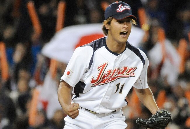 LOS ANGELES - MARCH 22: Pitcher Yu Darvish #11 of Japan celebrates after striking out Adam Dunn #17 of the United States to win the semifinal game of the 2009 World Baseball Classic on March 22, 2009 at Dodger Stadium in Los Angeles, California. Japan defeated the United States 9-4. (Photo by Kevork Djansezian/Getty Images)