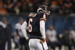 CHICAGO, IL - NOVEMBER 20:  Jay Cutler #6 of the Chicago Bears moves his head after being hit against the San Diego Chargers at Soldier Field on November 20, 2011 in Chicago, Illinois. The Bears defeated the Chargers 31-20.  (Photo by Jonathan Daniel/Getty Images)
