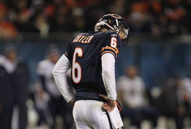 CHICAGO, IL - NOVEMBER 20:  Jay Cutler #6 of the Chicago Bears moves his head after being hit against the San Diego Chargers at Soldier Field on November 20, 2011 in Chicago, Illinois. The Bears defeated the Chargers 31-20.  (Photo by Jonathan Daniel/Getty Images)