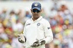 PERTH, AUSTRALIA - JANUARY 14:  MS Dhoni (top) of India looks down at team mate Virat Kohli after Kohli dropped a catch from David Warner of Australia during day two of the Third Test match between Australia and India at WACA on January 14, 2012 in Perth, Australia.  (Photo by Hamish Blair/Getty Images)