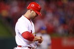 ST LOUIS, MO - OCTOBER 27: Matt Holliday #7 of the St. Louis Cardinals reacts after injuring his finger during Game Six of the MLB World Series against the Texas Rangers at Busch Stadium on October 27, 2011 in St Louis, Missouri.  (Photo by Ezra Shaw/Getty Images)