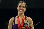 ONTARIO, CA - OCTOBER 23:  Alissa Czisny stands on the awards podium after receiving her gole medal in the Ladies competition during Hilton HHonors Skate America at Citizens Business Bank Arena on October 23, 2011 in Ontario, California.  (Photo by Stephen Dunn/Getty Images)