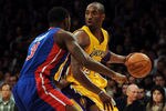 LOS ANGELES, CA - JANUARY 04:  Kobe Bryant #24 of the Los Angeles Lakers dribbles in front of Rodney Stuckey #3 of the Detroit Pistons at the Staples Center on January 4, 2011 in Los Angeles, California. NOTE TO USER: User expressly acknowledges and agrees that, by downloading and or using this photograph, User is consenting to the terms and conditions of the Getty Images License Agreement.  (Photo by Harry How/Getty Images)