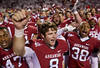FAYETTEVILLE, AR - NOVEMBER 12:   Quarterback Tyler Wilson #8 of the Arkansas Razorbacks sings the fight song with his teammates after a win against the Tennessee Volunteers at Donald W. Reynolds Stadium Stadium on November 12, 2011 in Fayetteville, Arkansas.  The Razorbacks defeated the Volunteers 49 to 7.  (Photo by Wesley Hitt/Getty Images)