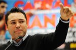 WASHINGTON, DC - DECEMBER 08:  President of Golden Boy Promotions Oscar De La Hoya speaks at a press conference at Walter E. Washington Convention Center on December 8, 2011 in Washington, DC.  (Photo by Patrick McDermott/Getty Images)