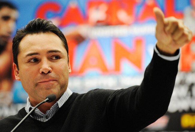 WASHINGTON, DC - DECEMBER 08:  President of Golden Boy Promotions Oscar De La Hoya speaks at a press conference at Walter E. Washington Convention Center on December 8, 2011 in Washington, DC.  (Photo by Patrick McDermott/Getty Images)