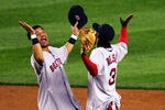 NEW YORK - SEPTEMBER 17:  Orlando Cabrera #44 and Pokey Reese #3 of the Boston Red Sox celebrate beating the New York Yankees 3-2 on September 17, 2004 at Yankee Stadium in the Bronx borough of New York City.  (Photo by Ezra Shaw/Getty Images)