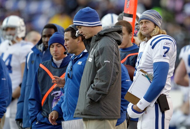 BALTIMORE, MD - DECEMBER 11:  Peyton Manning #18 (C) and Curtis Painter #7 of the Indianapolis Colts look on from the sidelines during the second half of the Colts and Baltimore Ravens game at M&T Bank Stadium on December 11, 2011 in Baltimore, Maryland.  (Photo by Rob Carr/Getty Images)