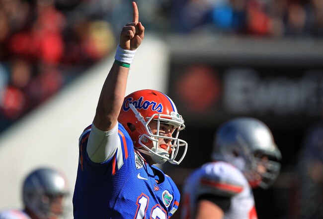 JACKSONVILLE, FL - JANUARY 02:  Quarterback John Brantley #12 of the Florida Gators celebrates a first half touchdown during the TaxSlayer.com Gator Bowl against the Ohio State Buckeyes at EverBank Field on January 2, 2012 in Jacksonville, Florida.  (Photo by Scott Halleran/Getty Images)