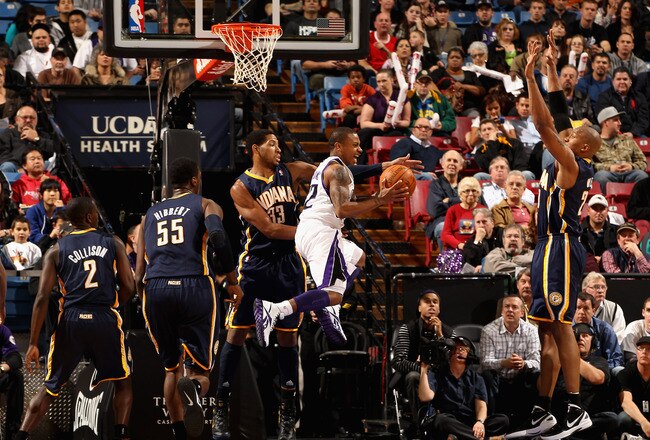 SACRAMENTO, CA - JANUARY 18:  Isaiah Thomas #22 of the Sacramento Kings drives to the basket against the Indiana Pacers at Power Balance Pavilion on January 18, 2012 in Sacramento, California. NOTE TO USER: User expressly acknowledges and agrees that, by downloading and or using this photograph, User is consenting to the terms and conditions of the Getty Images License Agreement.  (Photo by Ezra Shaw/Getty Images)