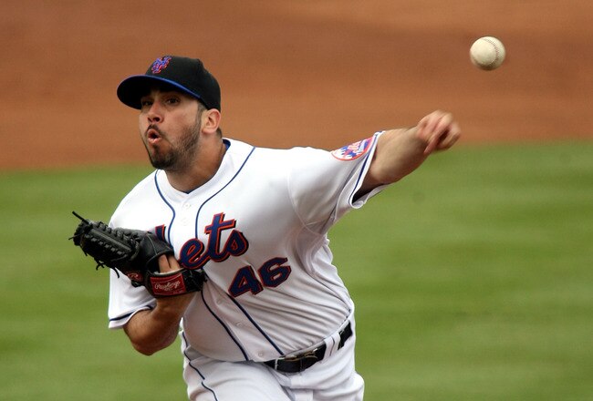 PORT ST. LUCIE, FL - MARCH 03:  Pitcher Oliver Perez #46 of the New York Mets throws against the St. Louis Cardinals at Digital Domain Park on March 3, 2011 in Port St. Lucie, Florida.  (Photo by Marc Serota/Getty Images)