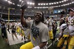 NEW ORLEANS, LA - JANUARY 03:  Denard Robinson #16 of the Michigan Wolverines celebrates after Michigan won 23-20 in overtime against the Virginia Tech Hokies during the Allstate Sugar Bowl at Mercedes-Benz Superdome on January 3, 2012 in New Orleans, Louisiana.  (Photo by Chris Graythen/Getty Images)