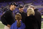 BALTIMORE, MD - NOVEMBER 24: Head coach Jim Harbaugh (L) of the San Francisco 49ers and his brother, head coach John Harbaugh of the Baltimore Ravens (C) talk with their parents Jack and Jackie Harbaugh, and John's daughter Allison, before the start of the game between the Baltimore Ravens and the San Francisco 49ers at M&T Bank Stadium on November 24, 2011 in Baltimore, Maryland.  (Photo by Rob Carr/Getty Images)