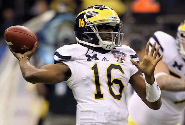 NEW ORLEANS, LA - JANUARY 03:  Denard Robinson #16 of the Michigan Wolverines throws a pass against the Virginia Tech Hokies during the Allstate Sugar Bowl at Mercedes-Benz Superdome on January 3, 2012 in New Orleans, Louisiana.  (Photo by Matthew Stockman/Getty Images)
