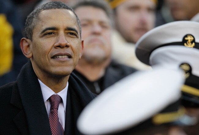 LANDOVER, MD - DECEMBER 10:  US President Barack Obama sits with Navy Midshipmen while watching the112th annual Army-Navy Game at FedEx Field on December 10, 2011 in Landover, Maryland.  (Photo by Rob Carr/Getty Images)