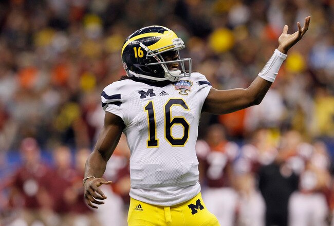 NEW ORLEANS, LA - JANUARY 03:  Denard Robinson #16 of the Michigan Wolverines celebrates after he threw an 18-yard touchdown pass to Junior Hemingway #21 in the third quarter against the Virginia Tech Hokies during the Allstate Sugar Bowl at Mercedes-Benz Superdome on January 3, 2012 in New Orleans, Louisiana.  (Photo by Kevin C. Cox/Getty Images)