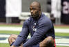 HOUSTON - SEPTEMBER 26:  Defensive end Mario Williams stetches during pre-game warm ups before playing the Dallas Cowboys at Reliant Stadium on September 26, 2010 in Houston, Texas.  (Photo by Bob Levey/Getty Images)