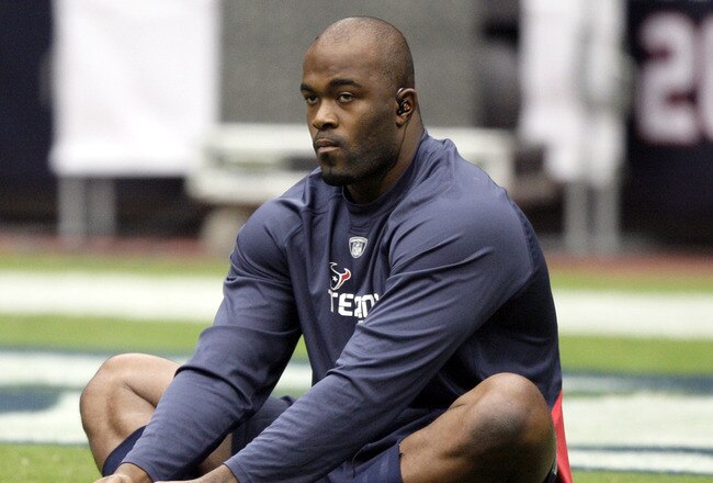 HOUSTON - SEPTEMBER 26:  Defensive end Mario Williams stetches during pre-game warm ups before playing the Dallas Cowboys at Reliant Stadium on September 26, 2010 in Houston, Texas.  (Photo by Bob Levey/Getty Images)