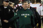 SOUTH BEND, IN - OCTOBER 22:  Head coach Brian Kelly of the Notre Dame Fighting Irish leaves the field after a loss to the University of Southern California Trojans at Notre Dame Stadium on October 22, 2011 in South Bend, Indiana. USC defeated Notre Dame 31-17.  (Photo by Jonathan Daniel/Getty Images)