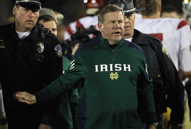 SOUTH BEND, IN - OCTOBER 22:  Head coach Brian Kelly of the Notre Dame Fighting Irish leaves the field after a loss to the University of Southern California Trojans at Notre Dame Stadium on October 22, 2011 in South Bend, Indiana. USC defeated Notre Dame 31-17.  (Photo by Jonathan Daniel/Getty Images)