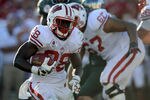 PASADENA, CA - JANUARY 02:  Running back Montee Ball #28 of the Wisconsin Badgers runs the ball in the first half against the Oregon Ducks at the 98th Rose Bowl Game on January 2, 2012 in Pasadena, California.  (Photo by Harry How/Getty Images)