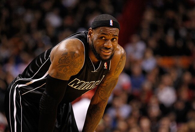 MIAMI, FL - JANUARY 19: LeBron James #6 of the Miami Heat looks on during a game against the Los Angeles Lakers at American Airlines Arena on January 19, 2012 in Miami, Florida. NOTE TO USER: User expressly acknowledges and agrees that, by downloading and/or using this Photograph, User is consenting to the terms and conditions of the Getty Images License Agreement.  (Photo by Mike Ehrmann/Getty Images)