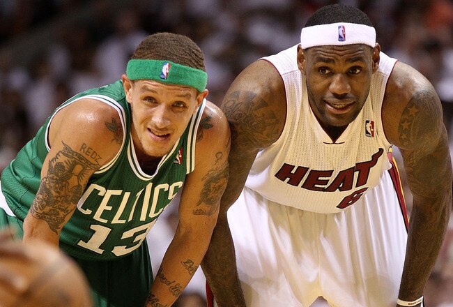 MIAMI, FL - MAY 03:  LeBron James #6 of the Miami Heat talks with Delonte West #13 of  the Boston Celtics during Game Two of the Eastern Conference Semifinals of the 2011 NBA Playoffs at American Airlines Arena on May 3, 2011 in Miami, Florida. NOTE TO USER: User expressly acknowledges and agrees that, by downloading and/or using this Photograph, User is consenting to the terms and conditions of the Getty Images License Agreement.  (Photo by Mike Ehrmann/Getty Images)