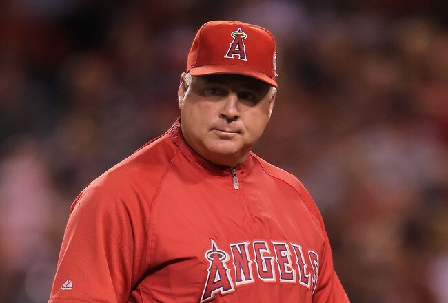 ANAHEIM, CA - SEPTEMBER 03:  Los Angeles Angels of Anaheim manager Mike Scioscia looks on against the Minnesota Twins at Angel Stadium of Anaheim on September 3, 2011 in Anaheim, California.  (Photo by Jeff Gross/Getty Images)