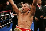 LAS VEGAS - NOVEMBER 04:  Orlando Salido of Mexico celebrates his victory against Robert Guerrero after their IBF Featherweight Championship fight at the Mandalay Bay Events Center November 4, 2006 in Las Vegas, Nevada. Salido won by unanimous decision.  (Photo by Ethan Miller/Getty Images)