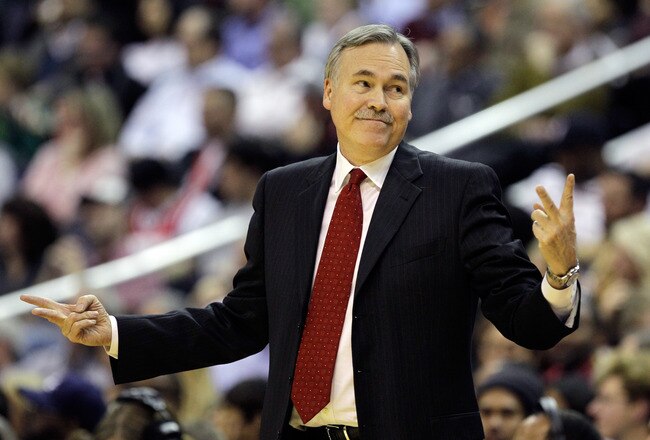 WASHINGTON, DC - JANUARY 06: Mike D'Antoni of the New York Knicks reacts to an officials call during the first half against the Washington Wizards at Verizon Center on January 6, 2012 in Washington, DC.  NOTE TO USER: User expressly acknowledges and agrees that, by downloading and or using this photograph, User is consenting to the terms and conditions of the Getty Images License Agreement.  (Photo by Rob Carr/Getty Images)