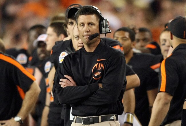 GLENDALE, AZ - JANUARY 02:  Head coach Mike Gundy of the Oklahoma State Cowboys looks on against the Stanford Cardinal during the Tostitos Fiesta Bowl on January 2, 2012 at University of Phoenix Stadium in Glendale, Arizona.  (Photo by Christian Petersen/Getty Images)