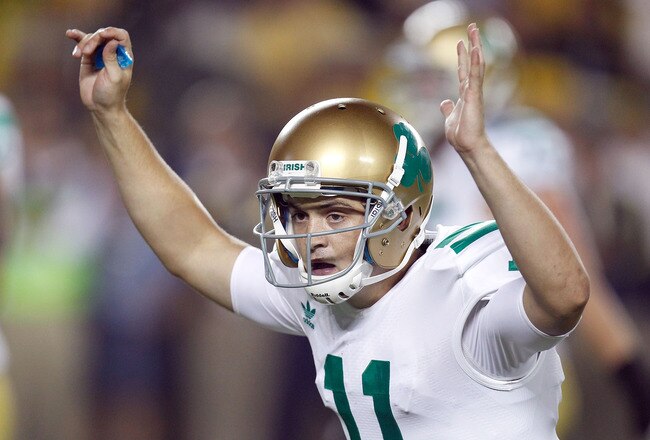 ANN ARBOR, MI - SEPTEMBER 10: Tommy Rees #11 of the Notre Dame Fighting Irish celebrates a third quarter touchdown while playing the Michigan Wolverines at Michigan Stadium on September 10, 2010 in Ann Arbor, Michigan. Michigan won the game 35-31. (Photo by Gregory Shamus/Getty Images)