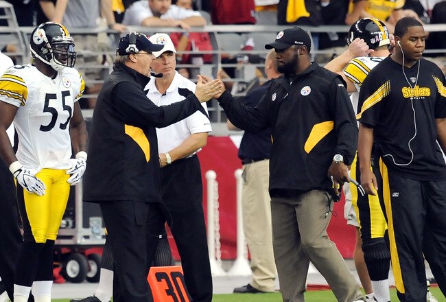 GLENDALE, AZ - OCTOBER 23:  Head Coach Mike Tomlin, on right, and Quarterbacks Coach Randy Fichtner of the Pittsburgh Steelers high five after a touchdown against the Arizona Cardinals at University of Phoenix Stadium on October 23, 2011 in Glendale, Arizona. Steelers won 32-20.  (Photo by Norm Hall/Getty Images)